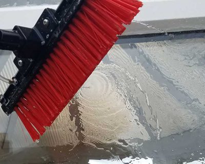 A window being professionally cleaned.