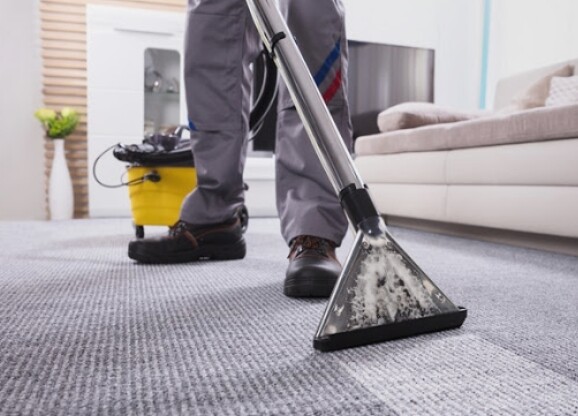 A carpet being professionally cleaned.